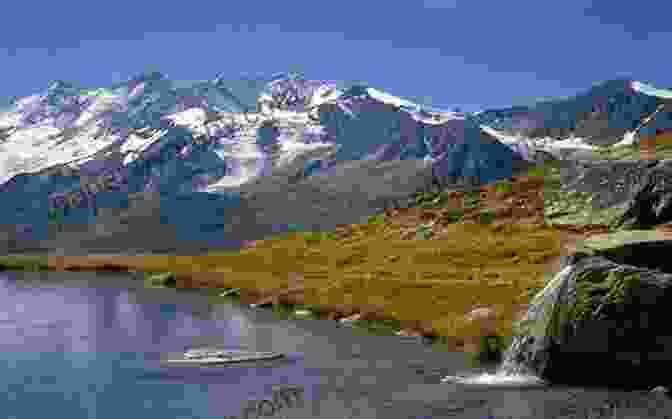 A Breathtaking View Of Majestic Snow Capped Mountains Against A Clear Blue Sky, Set In The Yukon Wilderness. Canada In Pictures: The Northern Territories Volume 3 Nunavut Yukon Territory And The Northwest Territories