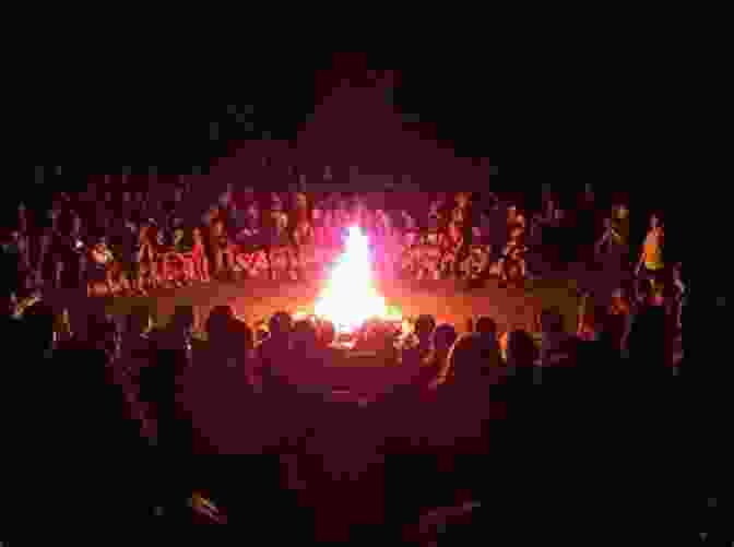 A Group Of People Gathered Around A Campfire, Symbolizing The Longing For Belonging SUMMARY Of FIND YOUR PEOPLE By Jennie Allen: Building Deep Community In A Lonely World