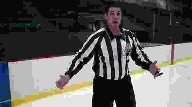 Hockey Referee In Action, Making A Call How To Referee Hockey: It Is Not Just About The Rule