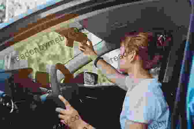 Image Of A Woman Adjusting Her Mirrors While Sitting In A Car Learn To Drive The Of Driving Lessons That Shows You How To Pass Your Driving Test (Manual UK)